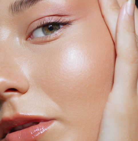 A,Close-up,Shot,Of,A,Woman,With,Glowing,Skin,And